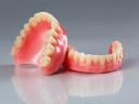 Struggling with Dentures? Consider Dental Implants Instead